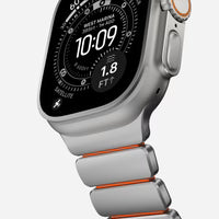 NOMAD Stratos Band – Ultra Orange (FKM + Titanium Hardware, Silver Finish)